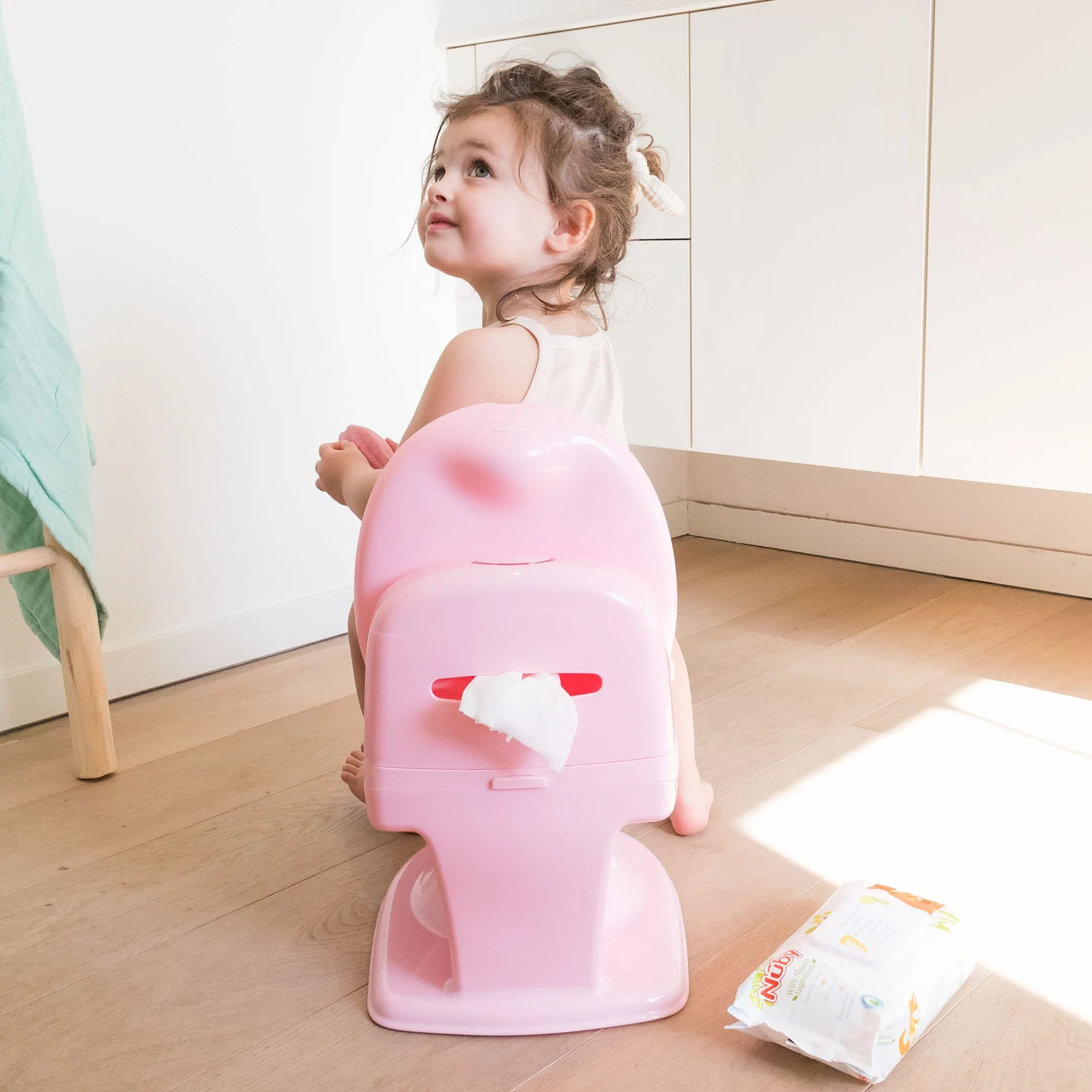 Nuby - My Real Potty – dziecięcy nocnik z hałasem płukania – trenażer toaletowy dla dzieci – z prawdziwym dźwiękiem i bateriami wchodzą w zakres dostawy – różowy – 18 miesięcy