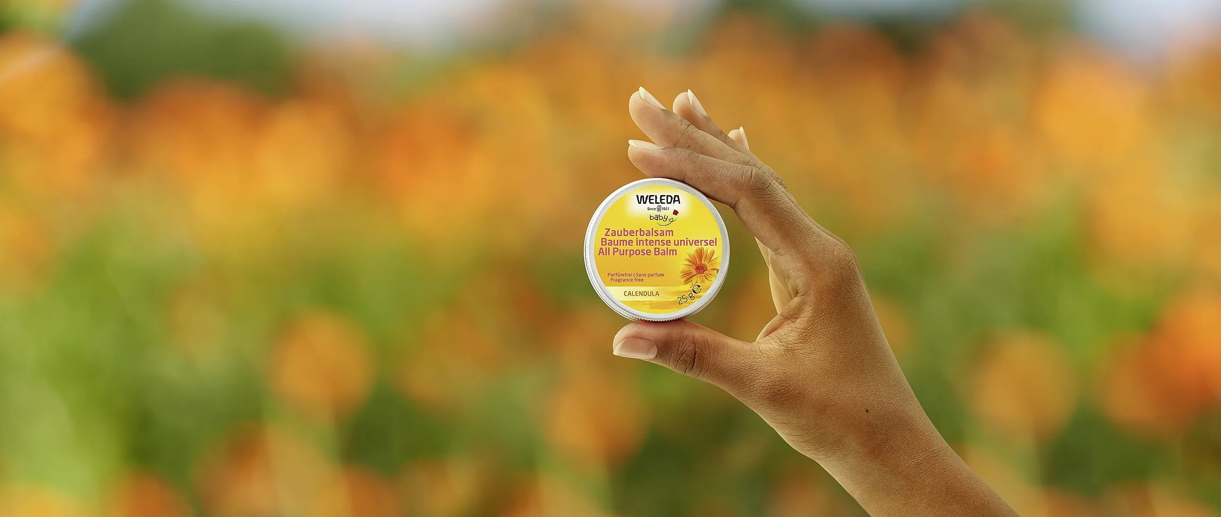 WELEDA Bio Baby Calendula magiczny balsam – naturalny kosmetyk, uniwersalny balsam do twarzy i ciała do pielęgnacji i uspokajania suchej skóry i ust. Bogaty balsam uniwersalny dla niemowląt i dzieci (1 x 25 g)