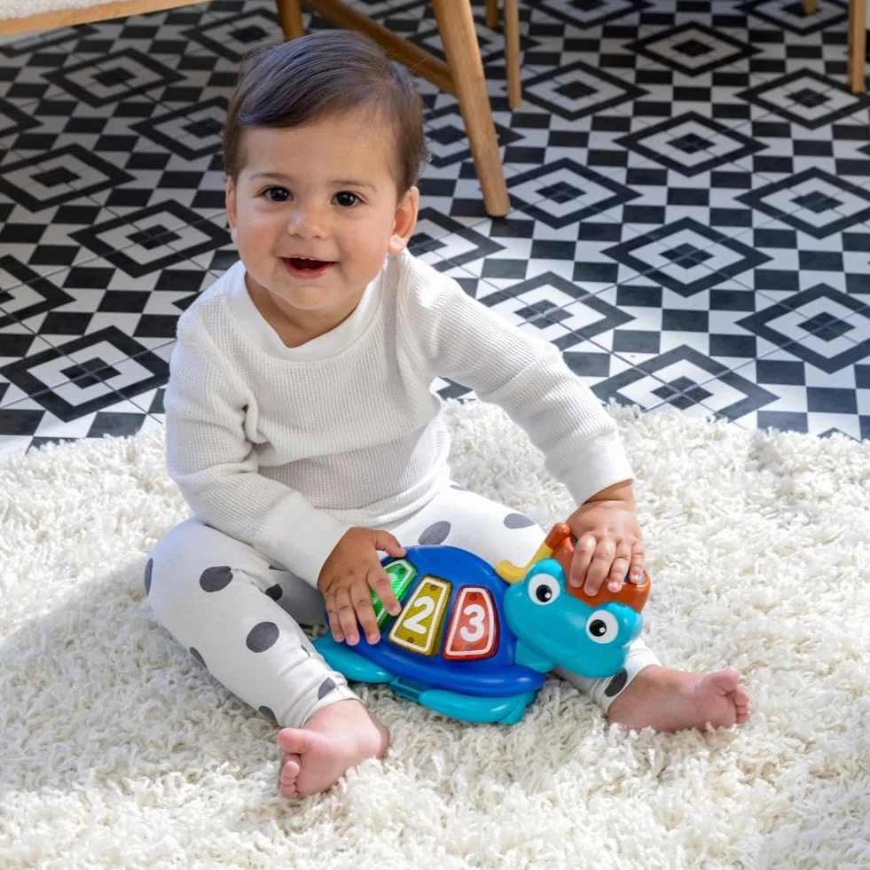 Baby Einstein 10455 Interaktywny Skoczek, Niebieski